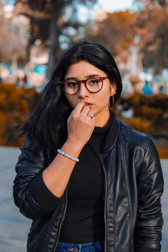 Lady wearing a leather jacket